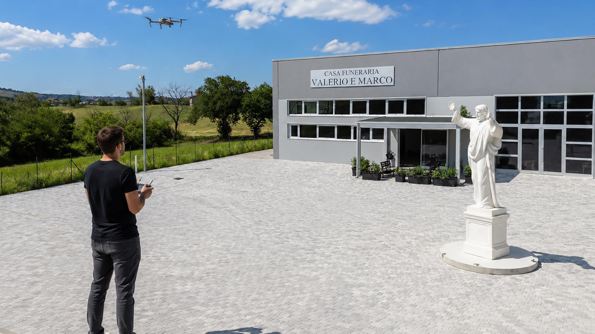 Videomaker mentre realizza riprese con drone esterno della Casa Funeraria Valerio e Marco