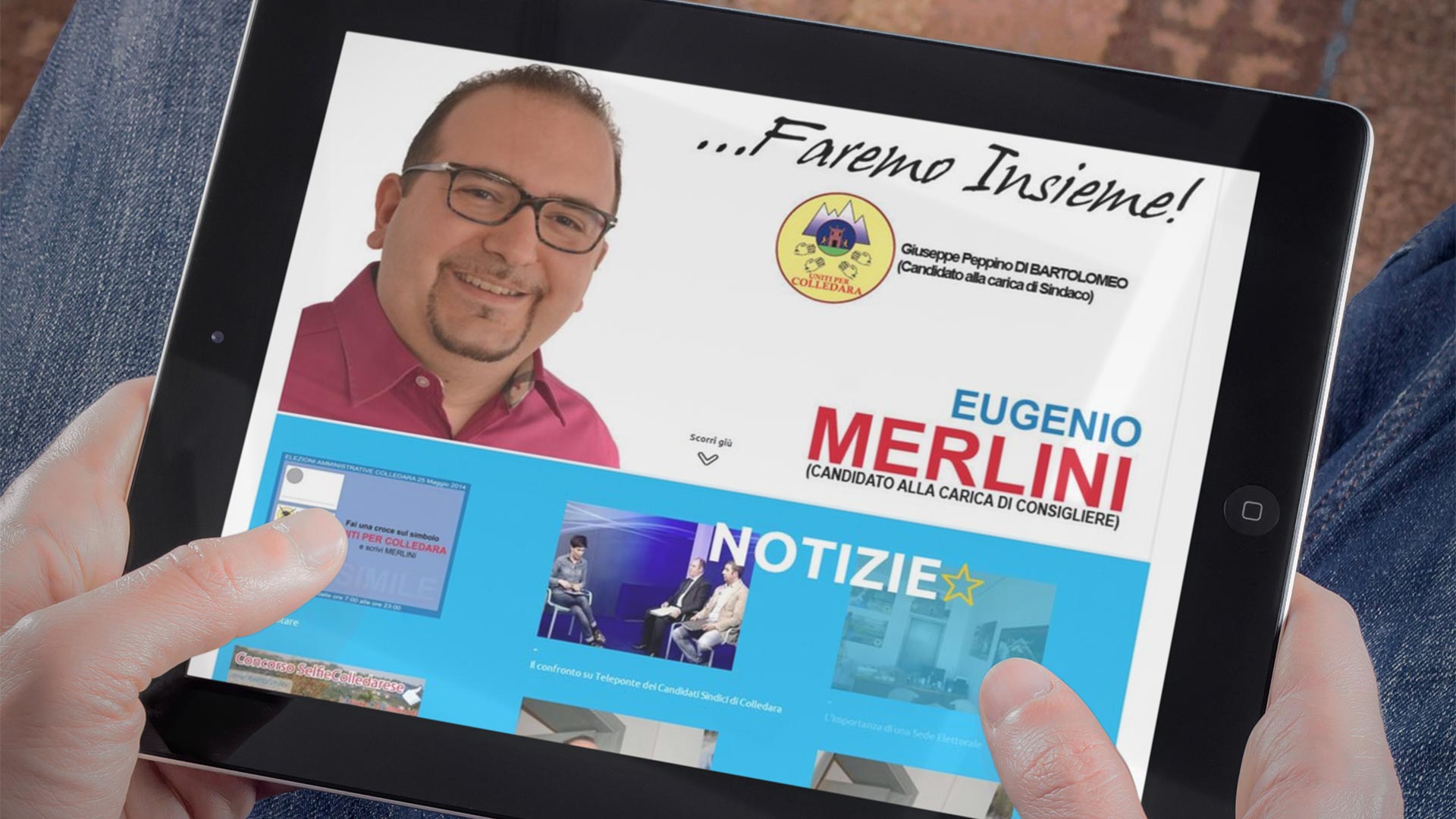 Tablet sulle gambe di un uomo che mostra il Sito Web di Eugenio Merlini