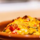 Piatto gratinato appena sfornato servito all'home restaurant Shanti
