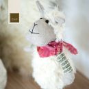 Lama decorativo bianco con grande fiocco rosa