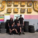 Squadra Gran Sasso Gomme davanti al deposito di pneumatici