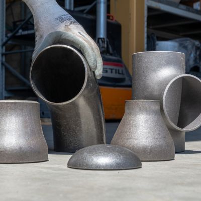 Assortimento di raccordi in acciaio FENP con curve, riduttori, fondelli e raccordi a T