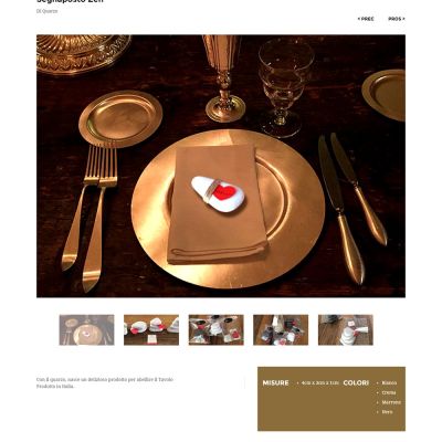 Pagina del sito Home Stone con un servizio da tavola in ambientazione scura
