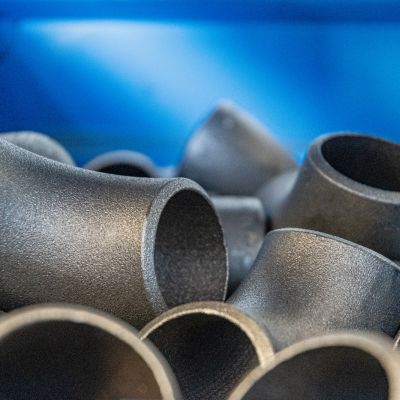 Assortimento di curve, raccordi a T e riduttori in acciaio FENP