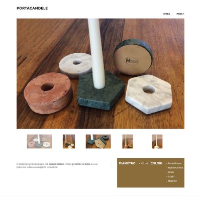 Pagina del sito Home Stone con taglieri rotondi in legno e pietra