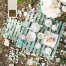 Tavola per matrimonio all'aperto realizzata su un pallet verde